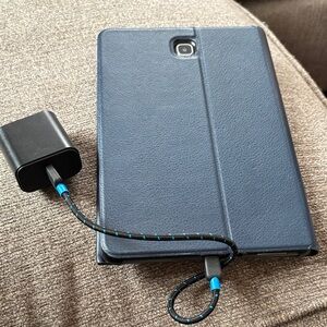 Blue Samsung Tablet with Charger